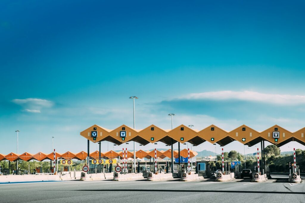 Cars Passing Through The Automatic Point Of Payment On A Toll Ro